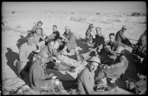 South Island infantry breakfast after a mock battle in the Western Desert