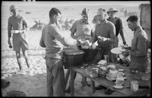 South Island infantrymen line up for breakfast during manoeuvres