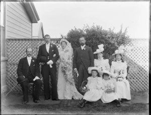 Wedding group, showing unidentified men and women, in an outdoor location, possibly Christchurch district