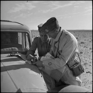 NZ officer pricking his position during the battle for the Western Desert