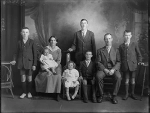 Studio portrait, family group, showing an unidentified man, woman and six children, Christchurch