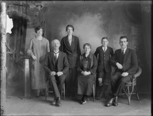 Studio portrait of a family group, showing three women, two men and a boy, all unidentified, Christchurch
