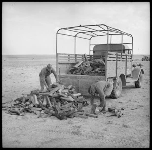 Unit transport picking up issue of firewood from ASC depot in Western Desert