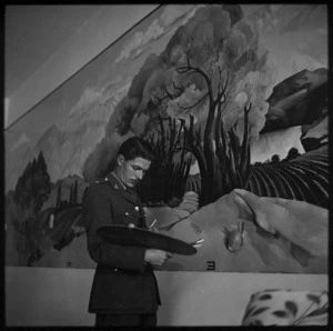Lt Peter McIntyre painting the mural in men's lounge at the NZ Forces Club, Cairo