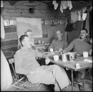 Capt I E Stock, Lt D J Henshaw and Lt J L McIndoe in their dugout, Western Desert