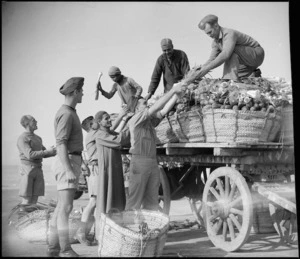 Soldiers unloading vegetables, Egypt