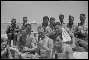 Troops eating meal outdoors, Egypt