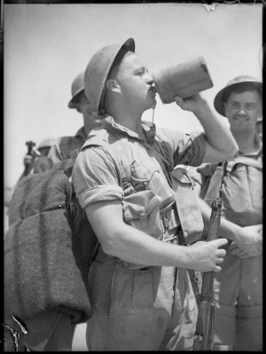 Soldier drinking from water bottle, Egypt