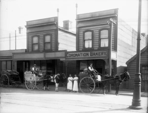 Horse drawn carts outside Taylor's Coronation Bakery, Adelaide Road, Newtown, Wellington