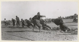 Maori Battalion winning a tug-of-war, near Bardia, Libya - Photograph taken by Edward Vere Hayward