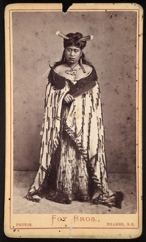Foy Brothers (Thames) :Unidentified Maori woman with huia feathers in her hair, Thames district