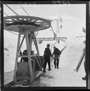 Unidentified skiers getting to the ski field at the New Zealand Ski championship, Mt Ruapehu