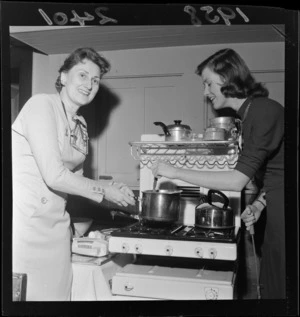 Mrs F H Russell and daughter Ailie giving a demonstration of American style cooking