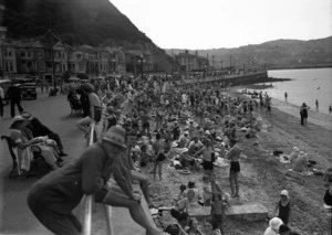 Crowd of people on the beach at Oriental Bay