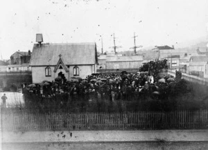 Williams, H :Group gathered around a church in Greymouth