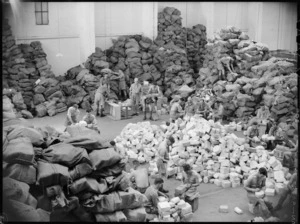 Piles of parcels being sorted in the NZ Army Post Office in Cairo, Egypt