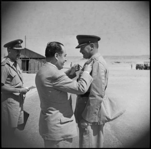 Major General B C Freyberg being invested with the Greek Military Cross by Greek Minister of War