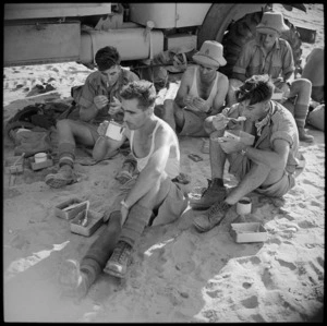 New Zealand troops on manoeuvres taking a meal break, El Saff, Egypt
