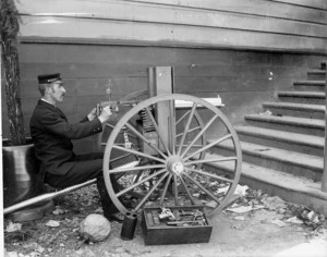 Member of constabulary with Maxim machine gun