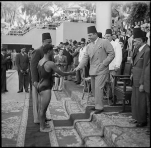 H Ratema, 3rd place getter in Egyptian National Swimming Title event, meeting King Farouk, Cairo