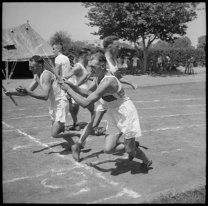 L/Cpl J Ferguson taking stick in inter-unit relay race at Prince Farouk Stadium, Cairo