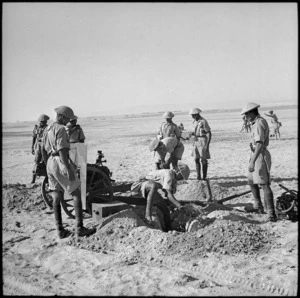 Indian troops digging gun pits during landing exercises with NZ infantry troops, Egypt - Photograph taken by M D Elias