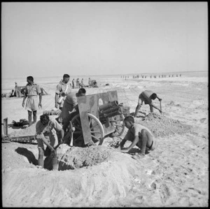 Indian gunners digging in gun on combined exercise, Egypt - Photograph taken by M D Elias