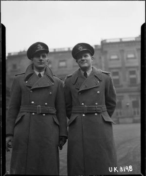 World War II pilot officers John Leonard Wright and Charles Wynne Brunsdon Kelly outside Buckingham Palace after receiving awards