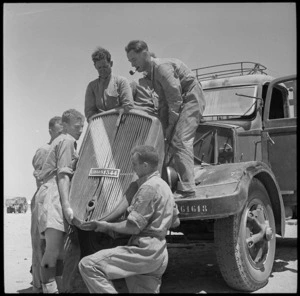 Fitting radiator to captured Italian truck at the NZ Field Ordnance Workshops, Egypt