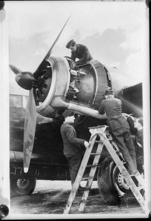 NZ mechanics at work on an aeroplane, Canada