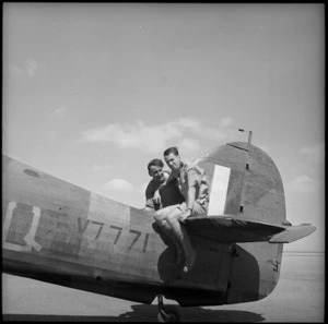 RAF ground staff holding down aircraft tail, Egypt