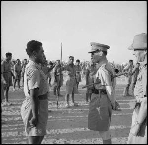 King of Greece talking with Cpl Anaia Amohau, composer of the song 'Maori Battalion', Helwan