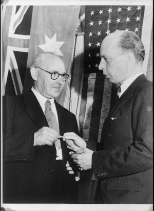 William Ruxton presents Wings of Mercy badge to the Hon Frank Langstone at the Anzac War Relief Fund reception at New York