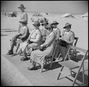 Matron in Chief Emily Nutsey and nursing staff seated at ceremony, Egypt, World War II