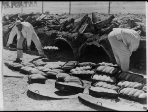 Opening the ovens at the Field Bakery, Egypt