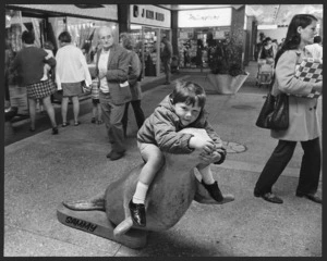 Boy sitting on Sammy the seal, Johnsonville Mall, Wellington