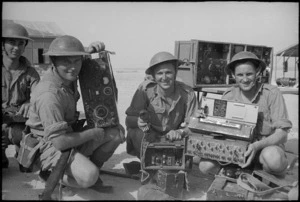 Members of NZ Divisional Signals with equipment brought out from Greece