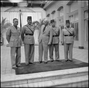 Prime Minister Peter Fraser with 2 Lt C F Skinner and high offices of the Egyptian army, Cairo