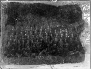 A group of unidentified people under some gum trees, probably Christchurch district