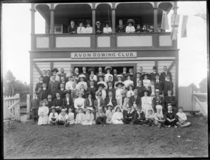 Large unidentified group outside the Avon Rowing Club, Christchurch, including people upstairs on the top floor balcony