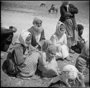 Syrian family resting by the roadside - Photograph taken by H Paton