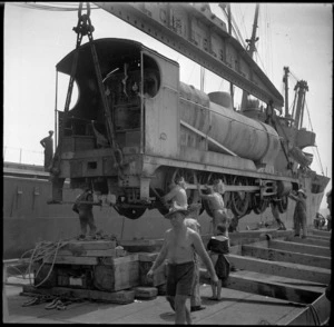 New Zealand Engineers unloading a locomotive at a Syrian port - Photograph taken by H Paton