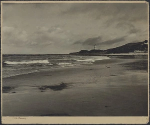 Beach and headland with lighthouse
