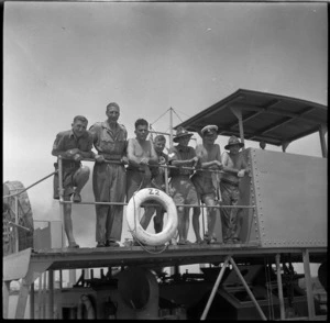 Group of New Zealanders on a lighter at a Syrian port - Photograph taken by H Paton