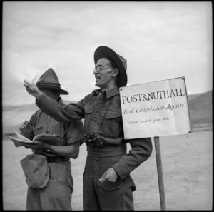 Post and Nuthall, Turf Commission Agents, at 36 NZ Survey Bty race meeting in Trans Jordania, World War II - Photograph taken by M D Elias