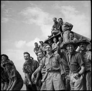 Enthusiastic supporters at race meeting held by 36 NZ Survey Bty in Trans Jordania, World War II - Photograph taken by M D Elias