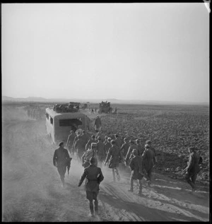 Italian POWs coming in under French guard in Tunisia - Photograph taken by M D Elias