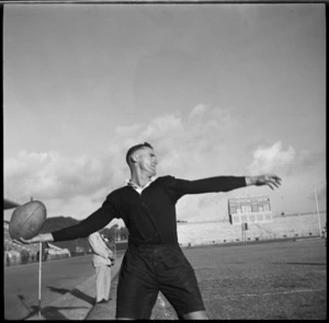 NZEF winger McAneny throwing in rugby ball at match in Alexandria, Egypt