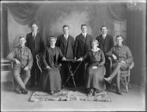 Unidentified studio portrait, probably a family, including two men in military uniforms, Christchurch