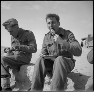 Two NZ soldiers eating Christmas dinner in Egypt